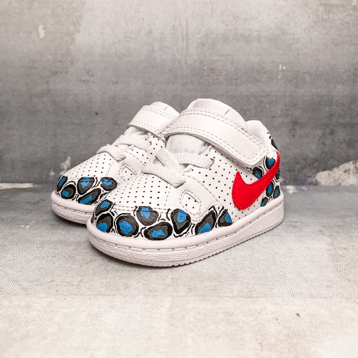 cdg nike air force 1 dinosaur
