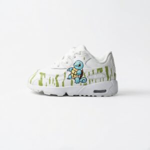 Handbeschilderde Nike Air Max 90 baby sneaker maat 22 in wit en groen met een blauw schildpad-figuur.